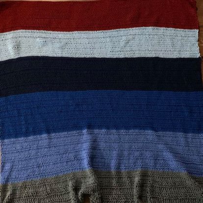 Made a blanket out of scrap yarn
